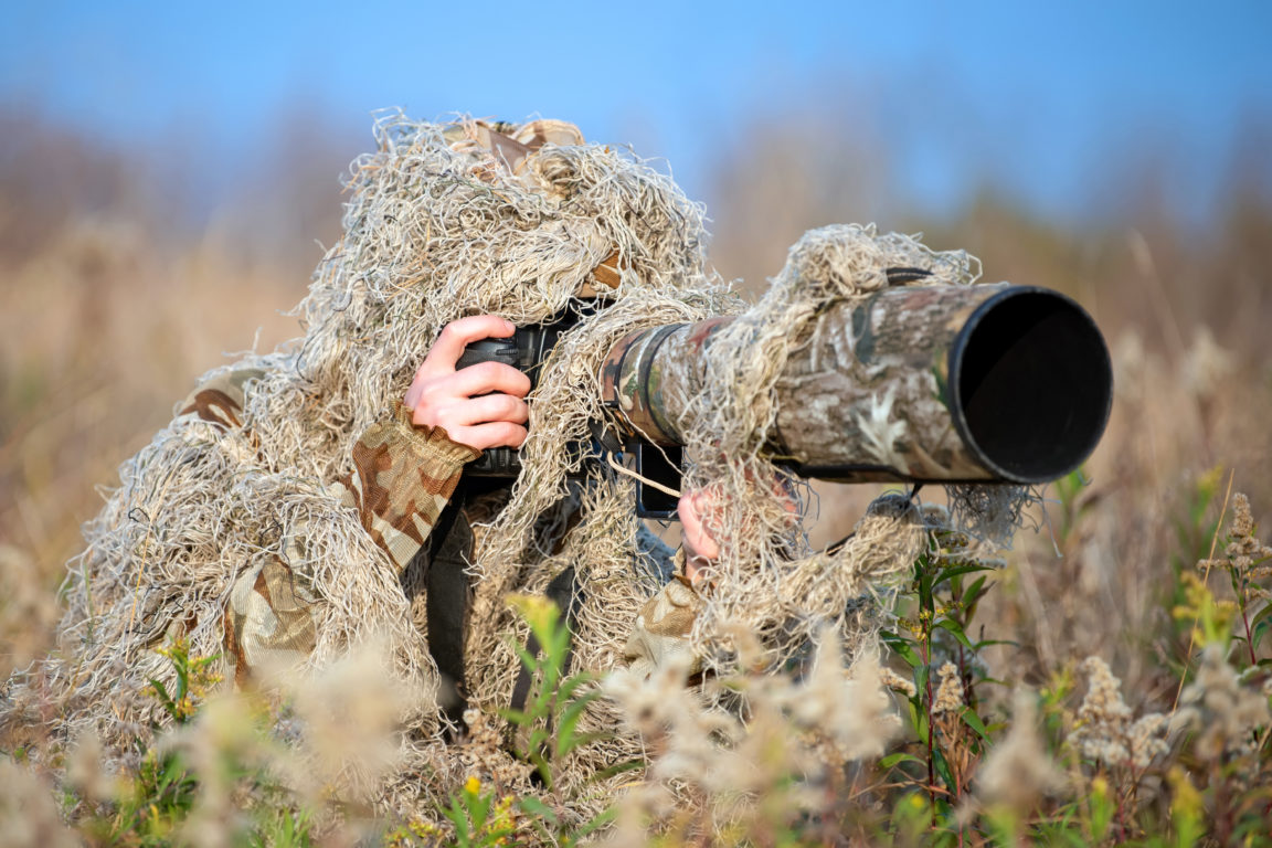 wildlife photographer in the ghillie suit working 2021 04 02 19 37 42 utc