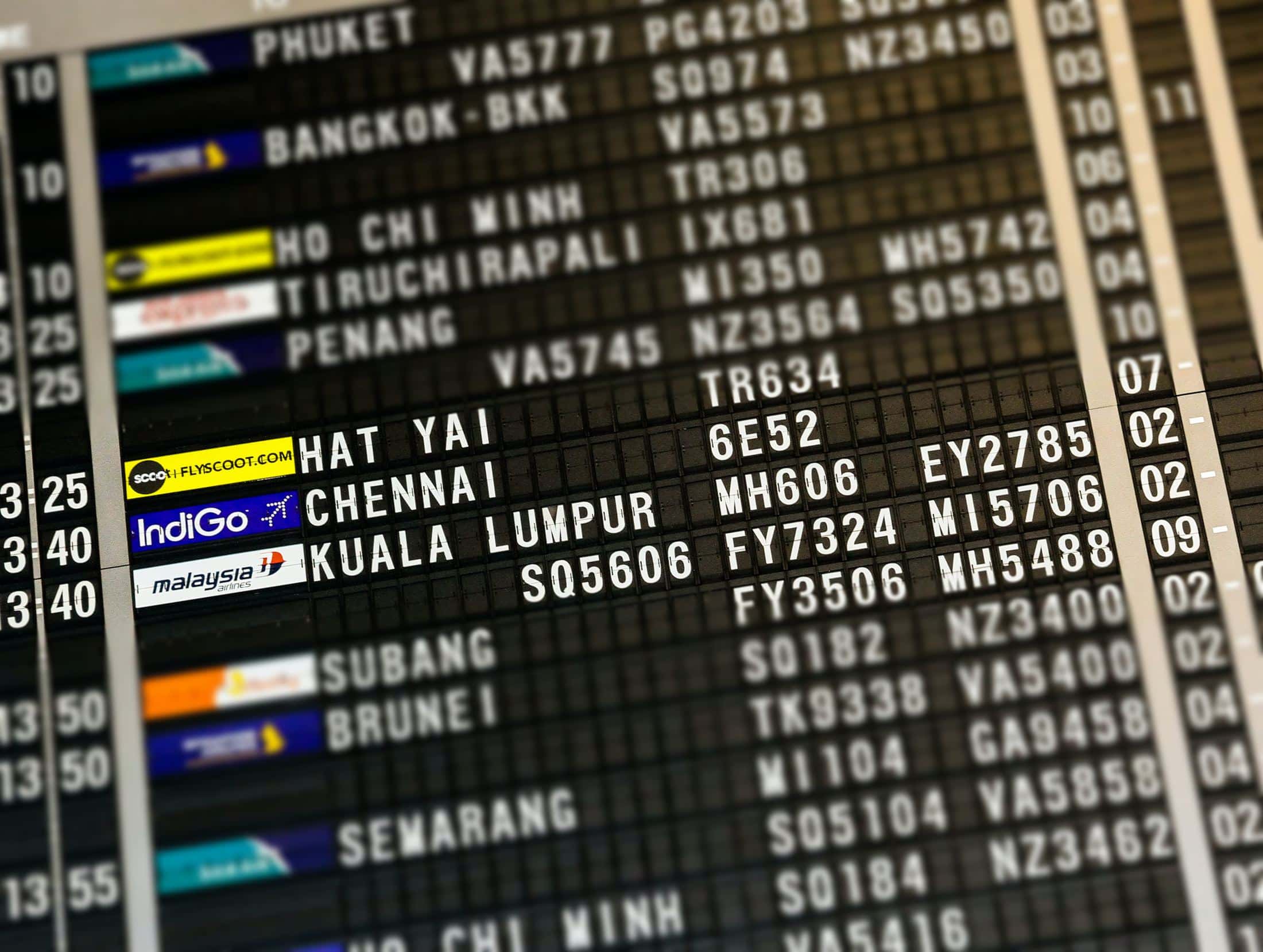 flight board highlighting Hat Yai, Chennai, and Kuala Lumpur