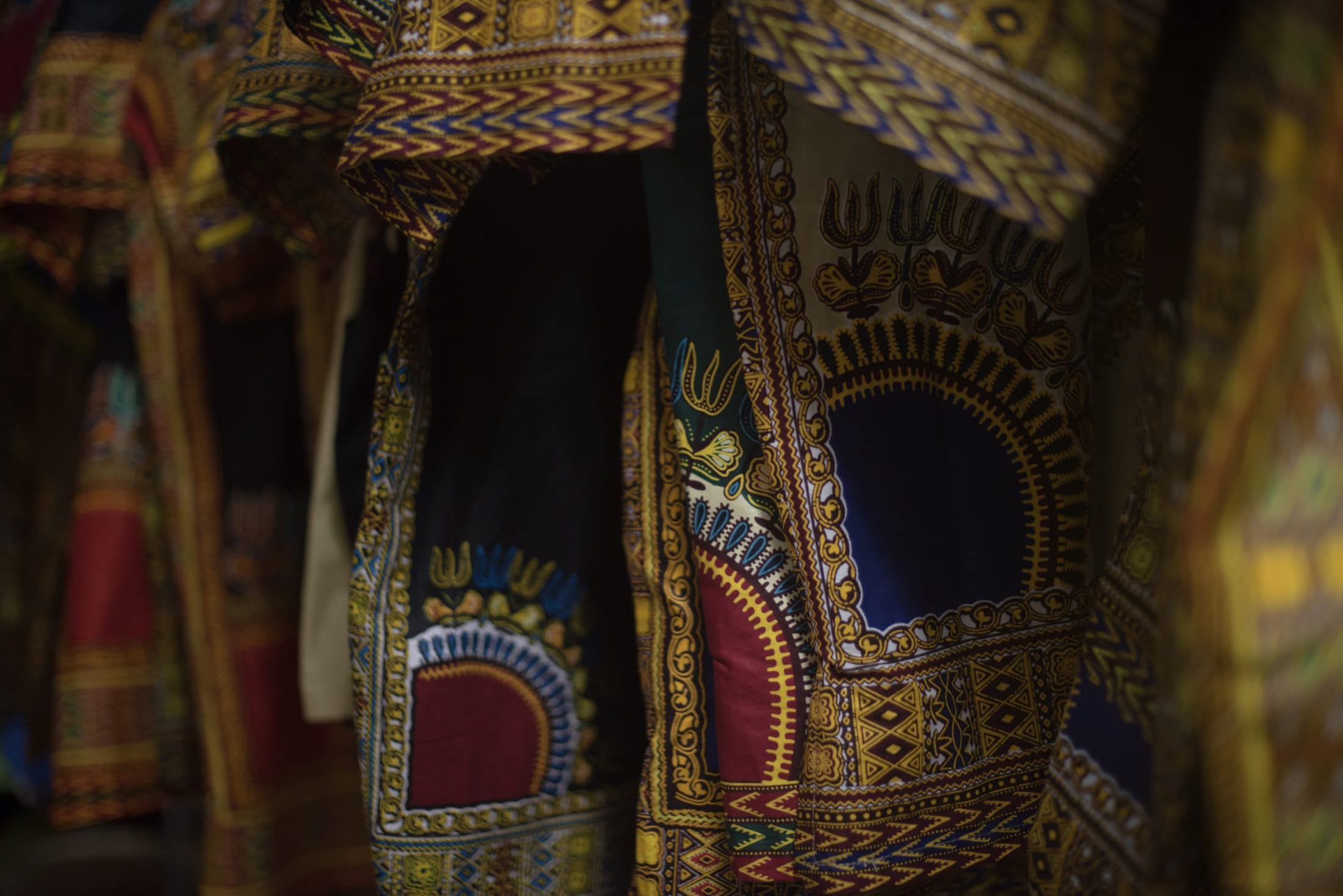 close up shot of african print clothing hanging on QB9FJXG scaled