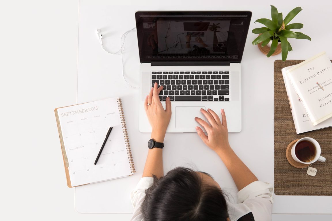 person using macbook pro