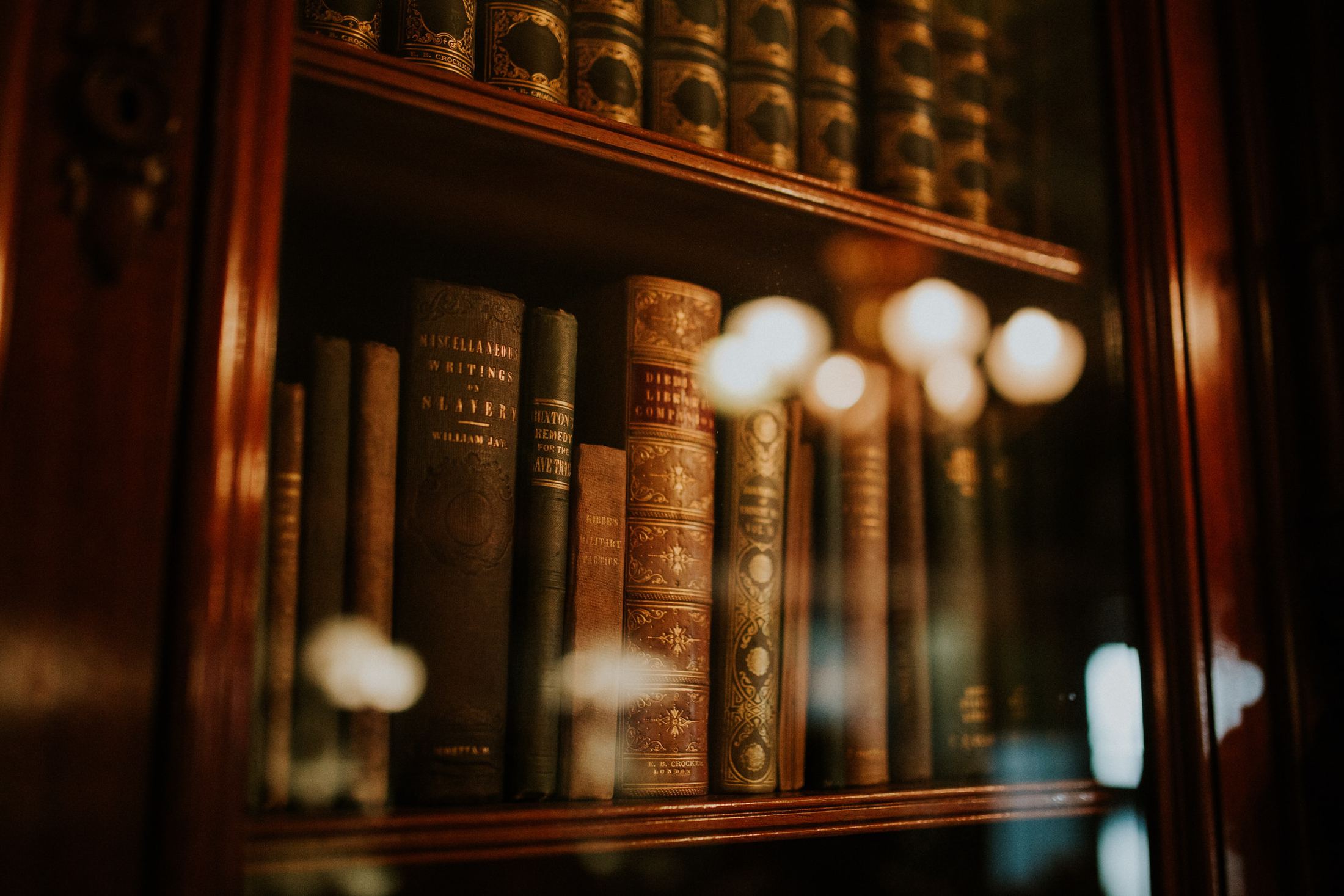 Five Art Masters You Should Consider books in glass bookcase