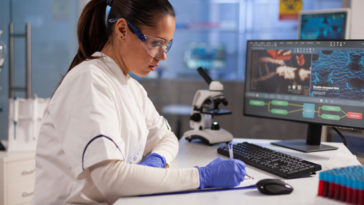 microbiology specialist testing dna sample on micr 2021 09 03 20 12 56 utc