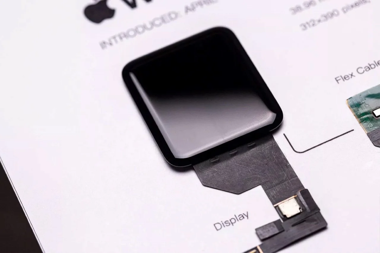 Uncover Tech's Beauty With This Apple Watch 1st Gen. Disassembled Into All its Tiny Parts