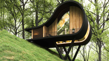 modern hobbit house cabin in the woods 6