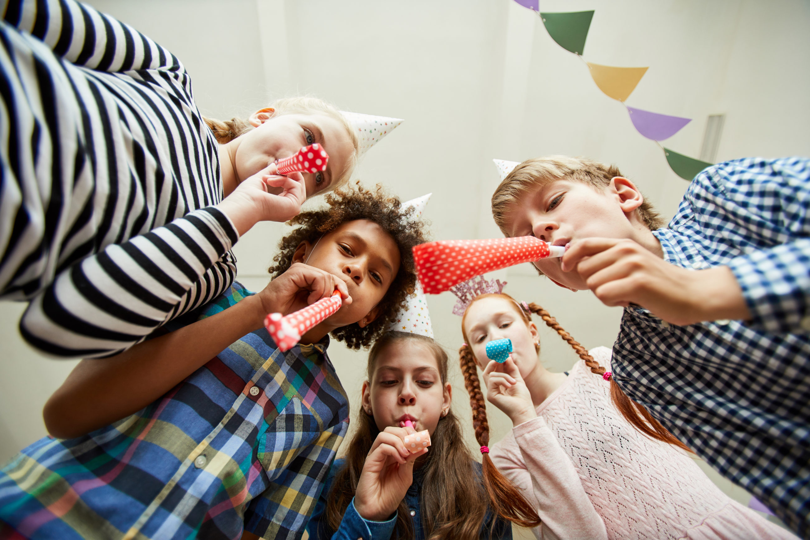 group of children blowing party horns 2022 02 08 22 39 31 utc