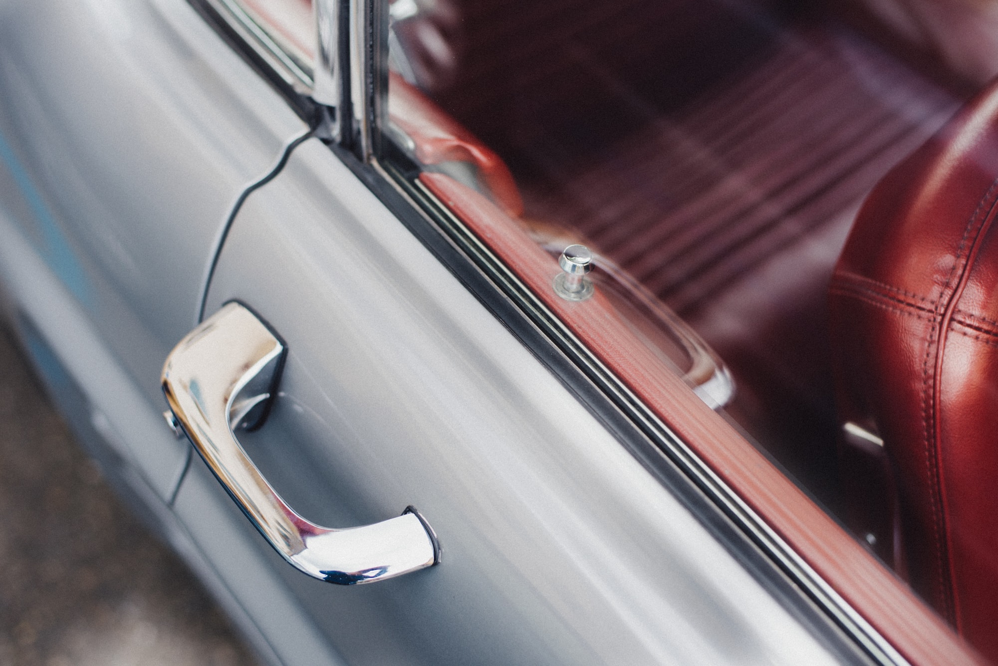 4 Simple Ways to Take Better Care of Your Car selective focus photo of gray vehicle door handle