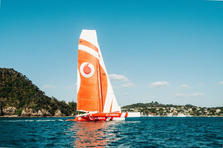 orange and white boat during daytime