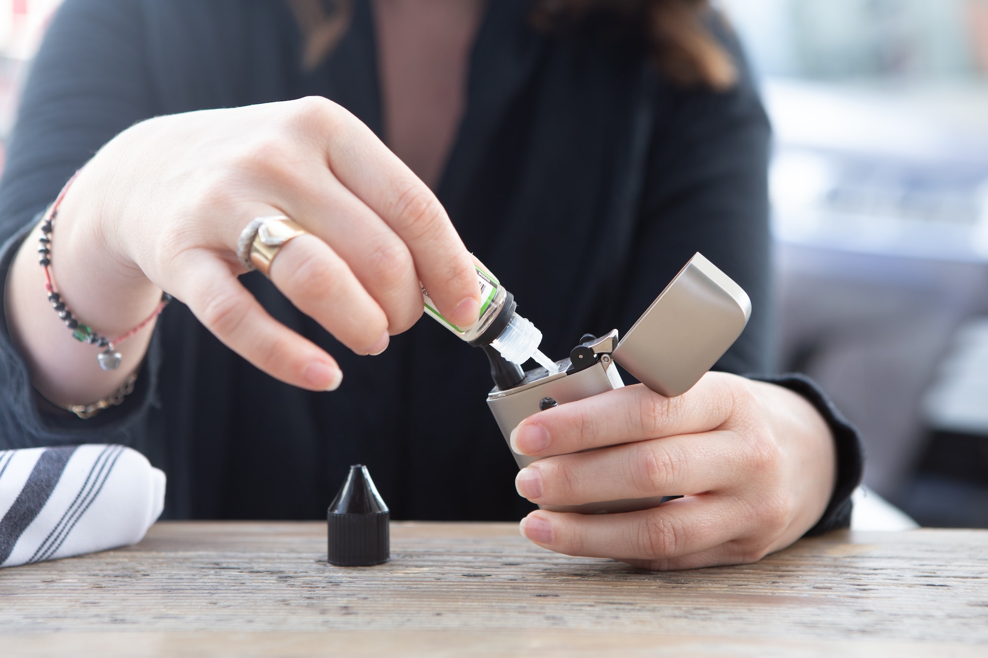 How To Choose The Right Vaping Device For You person holding silver flip lighter