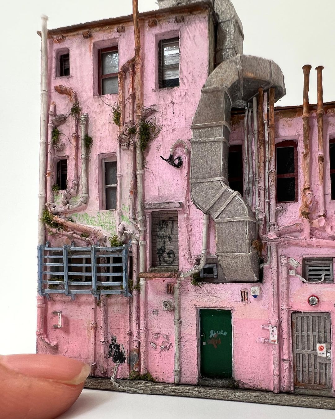 a close up of a pink building